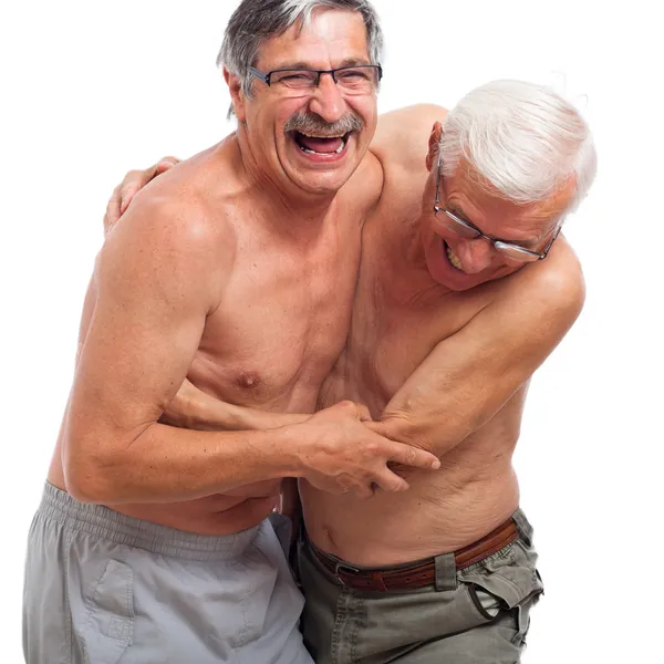 Laughing seniors fighting for fun — Stock Photo, Image