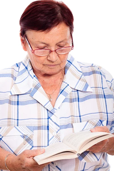 Senior woman reading book — Stock Photo, Image
