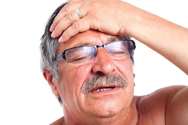 Äldre man med huvudvärk — Stockfoto