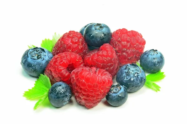 Raspberries and blueberries — Stock Photo, Image