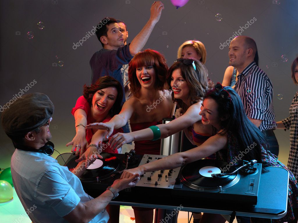 Women flirting with dj in night club — Stock Photo © shotsstudio #11842754