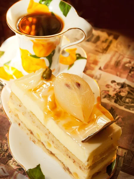 Sponge pear cake with soft praline in cafe — Stock Photo, Image