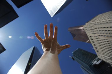 Reaching out the skyscrapers clipart