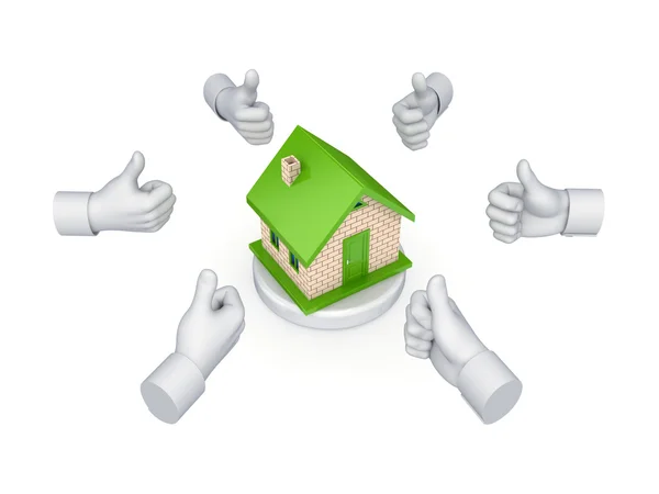 Hands with thumbs up around small house. — Stock Photo, Image