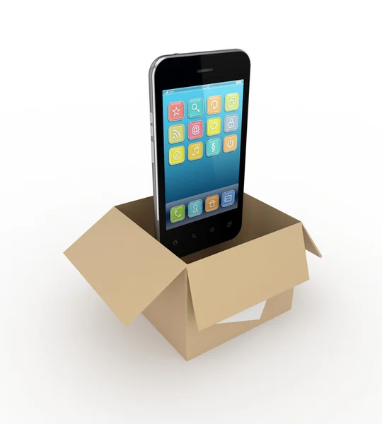 Teléfono móvil moderno en una caja de cartón . —  Fotos de Stock