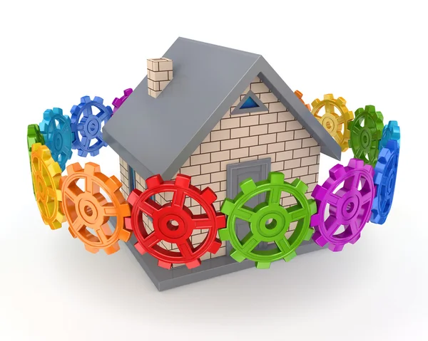 Colorful gears around small house. — Stock Photo, Image