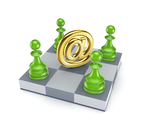 Green pawns around AT symbol. — Stock Photo, Image