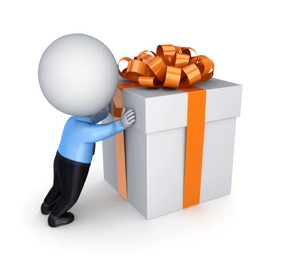 3D kleine Person schiebt eine Geschenkbox. — Stockfoto