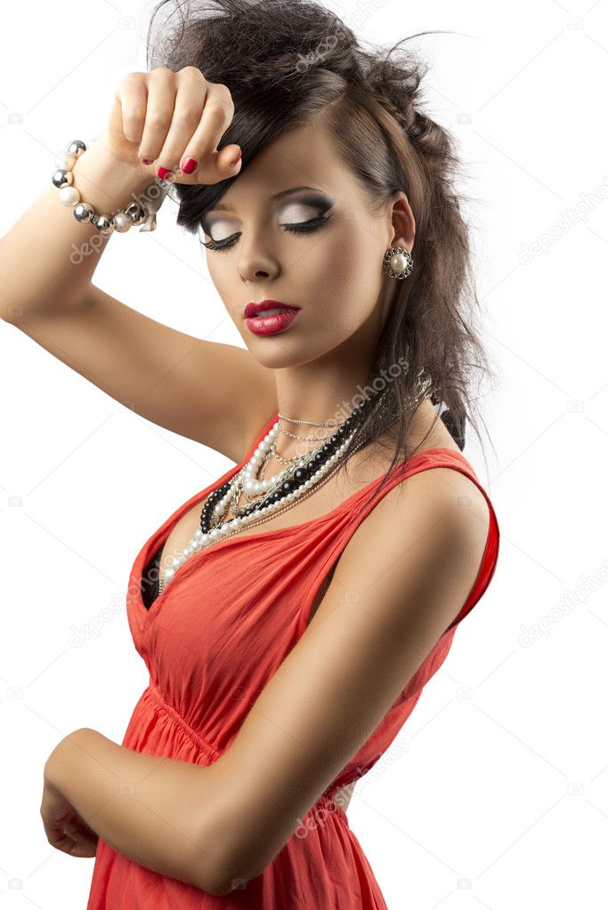 Portrait of fashion brunette with hand on her front