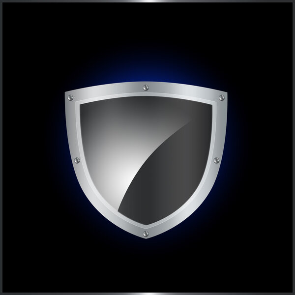 Абстрактный металлический щит на черном фоне
.