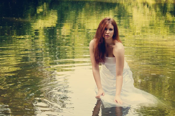 Bride in water — Stock Photo, Image