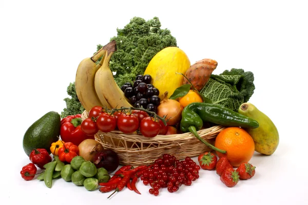 Fruits and vegetables in a basket — Stock Photo, Image