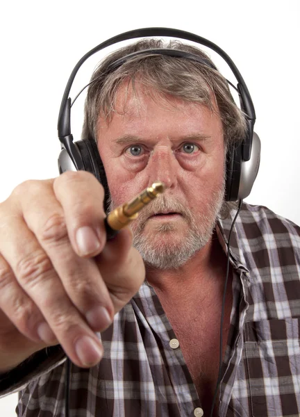 Staré člověk je wearinga sluchátka — Stock fotografie