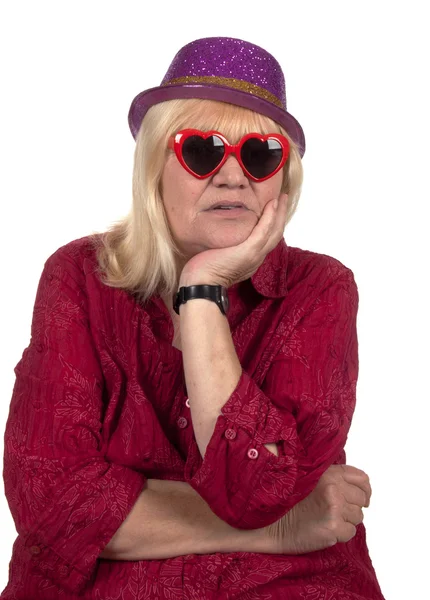 Ältere blonde Frau mit einem — Stockfoto