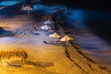 Summer beach night view (Albania) clipart