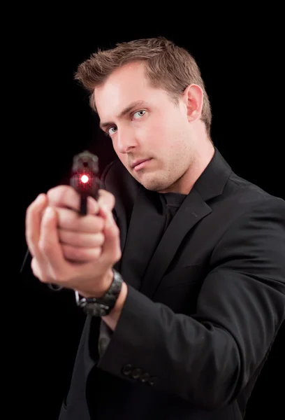 Male caucasian model with a gun — Stock Photo, Image