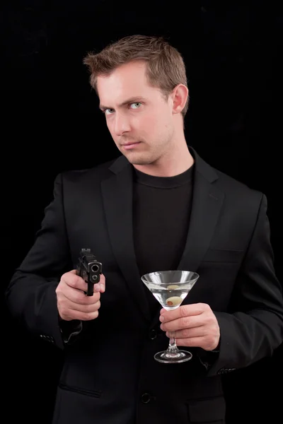 Male caucasian model with a gun — Stock Photo, Image