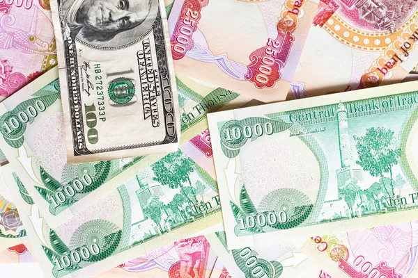 Dinaro iracheno e cento dollari — Foto Stock
