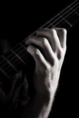 Dominant seventh chord (E7) on electric guitar; toned monochrome image clipart