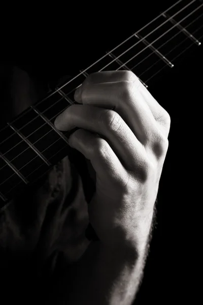 Septième accord réduit (A-dim7) à la guitare électrique ; image monochrome tonique — Photo