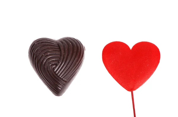 Atelierbild von Schokolade auf weißem Hintergrund zum Thema Liebe — Stockfoto