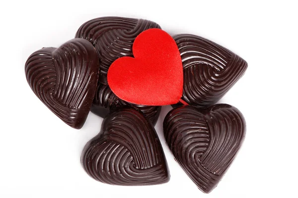 Atelierbild von Schokolade auf weißem Hintergrund zum Thema Liebe — Stockfoto