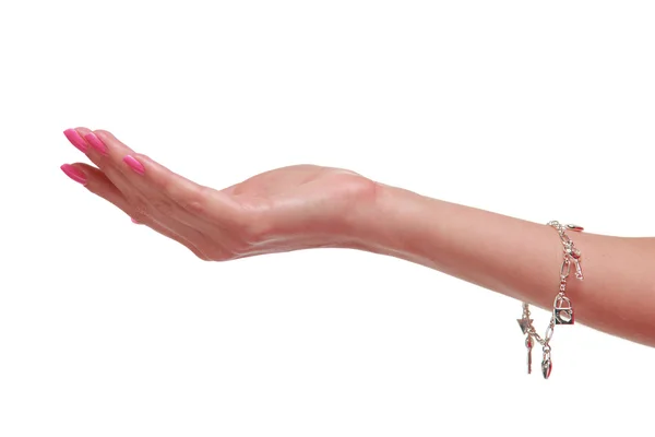 Mulher mão com linda manicure rosa sobre fundo branco — Fotografia de Stock