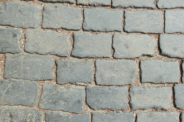 Outdoor image of vintage stone paved road on a Red Square in Moscow