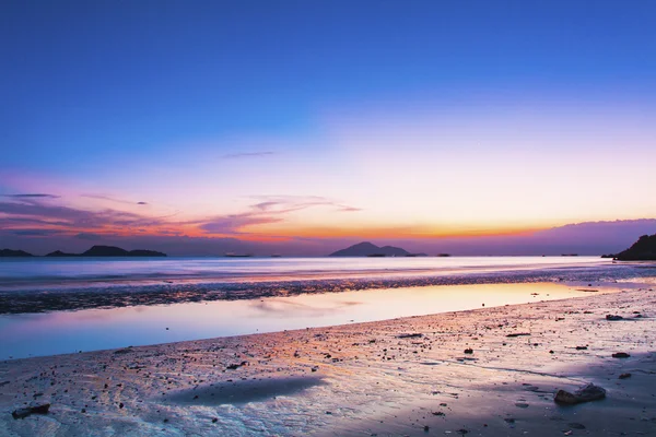 Gün batımında hong Kong kıyısı — Stok fotoğraf