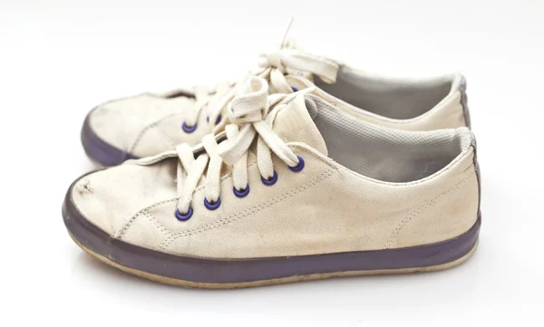 Пара старих спортивних взуття — стокове фото