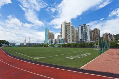 Running track and stadium in residential area clipart