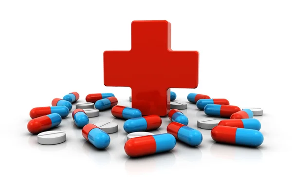 Medicinsk rødt kors med piller - Stock-foto
