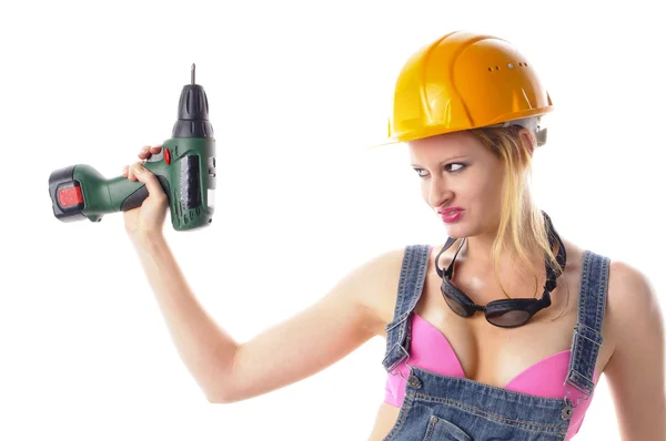 Sexy craftswoman in overalls — Stock Photo, Image