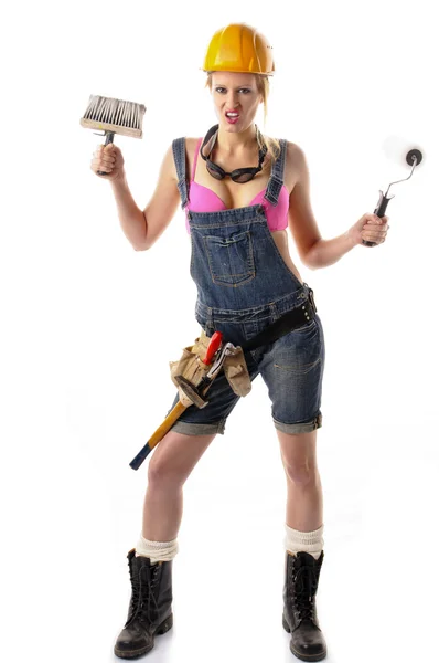 Sexy craftswoman in overalls — Stock Photo, Image