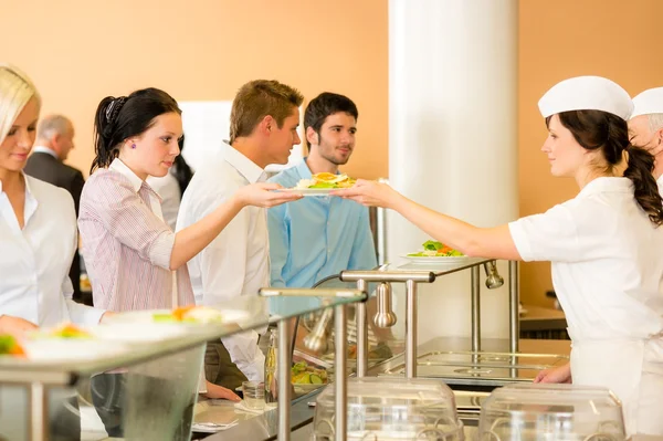 Office woman in canteen lunch-lady serve meals — Stock Photo, Image