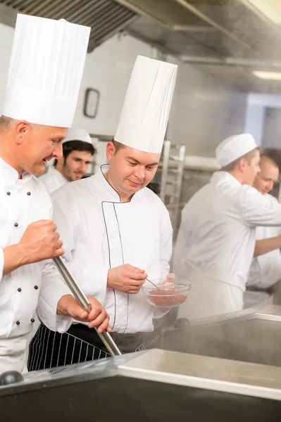 Two male cook work in professional kitchen — Stock Photo, Image