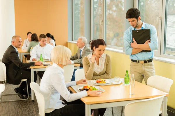 Lunch break office colleagues eat salad cafeteria — Stock Photo, Image