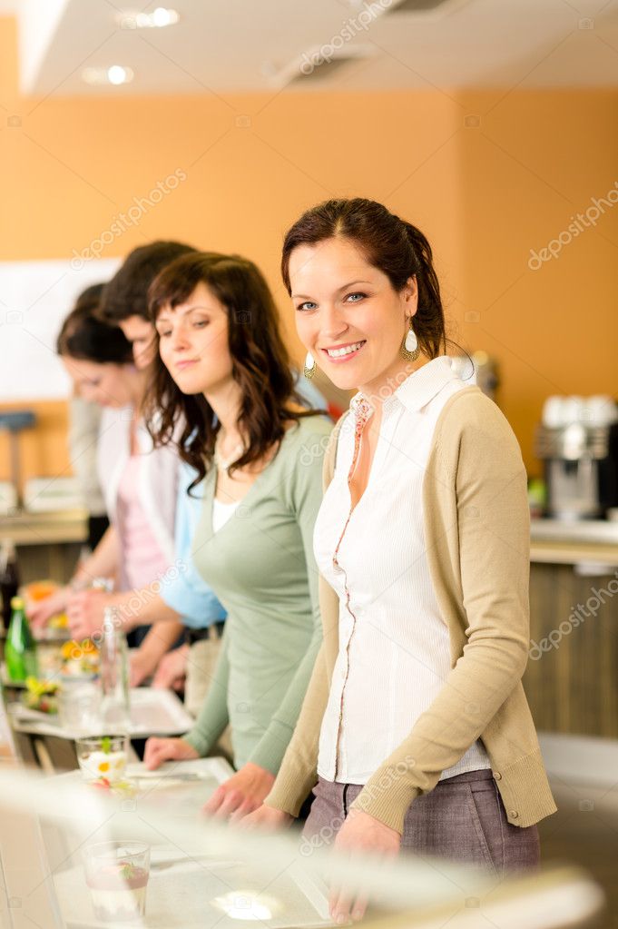 Business woman take cafeteria lunch smiling
