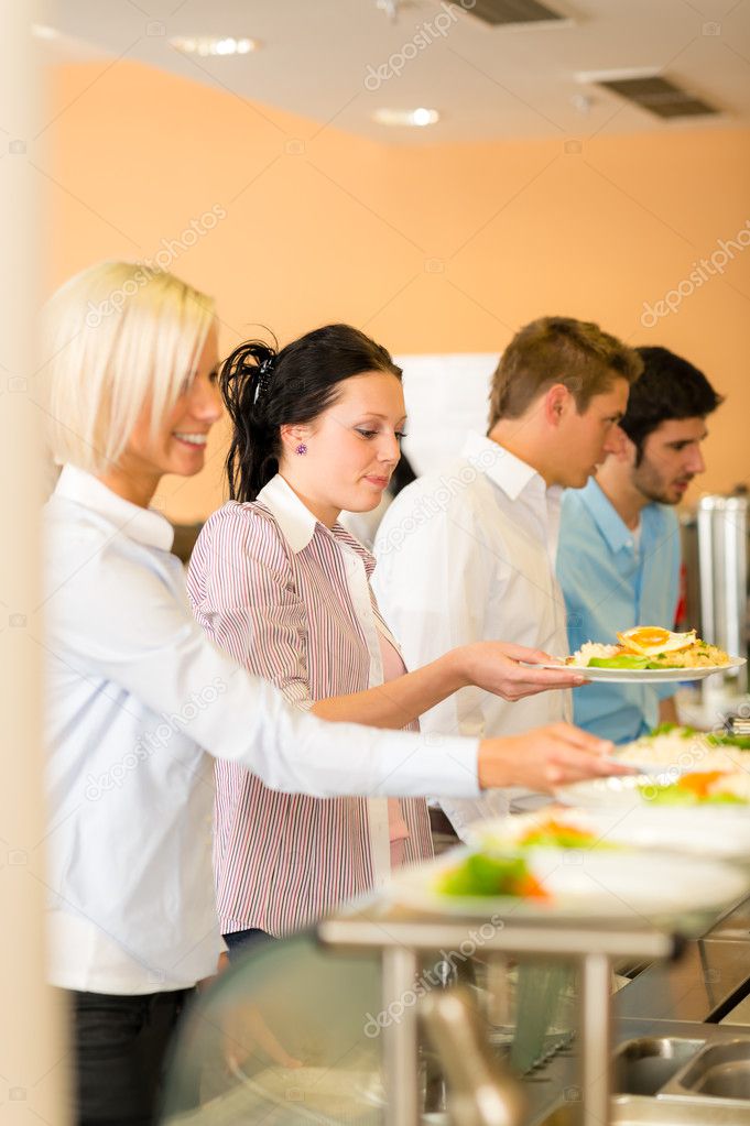 Young business colleagues queue canteen lunch