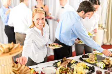 Business woman serve herself at buffet clipart