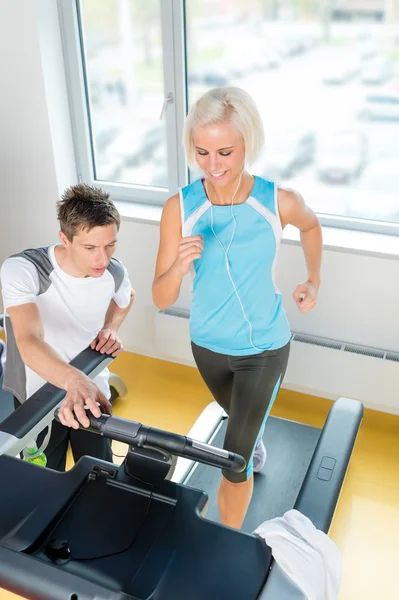 Young fitness instructor woman running at gym — Stock Photo, Image