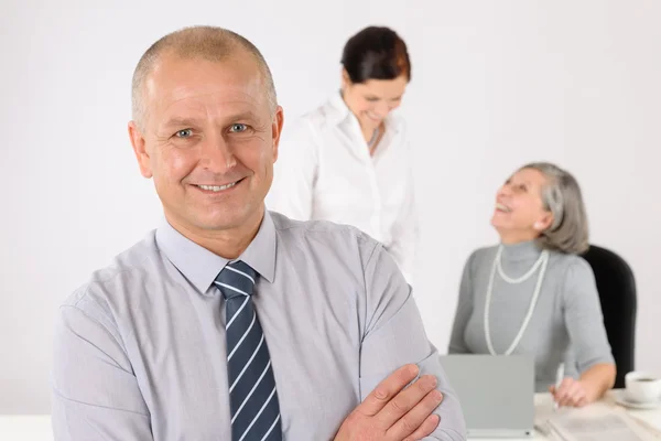 Business team senior manager with happy colleagues — Stock Photo, Image
