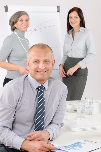 Smiling businessman during team meeting — Stock Photo, Image
