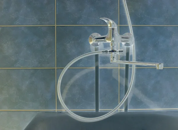 Shaded crome shower faucet turned to right — Stock Photo, Image