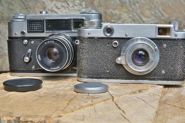 stock image Two old fashioned cameras are in shape