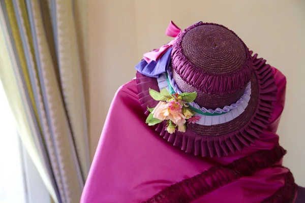 stock image Interesting previous century pink dress and hat