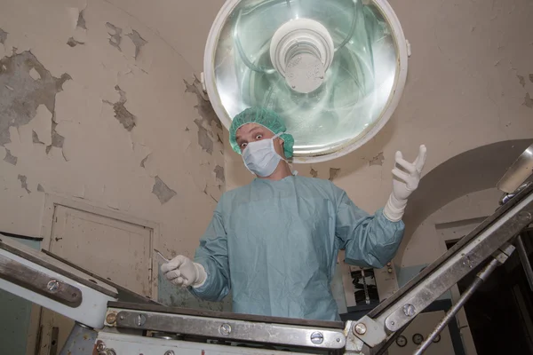 Surgeon making some fun before coming surgery — Stock Photo, Image