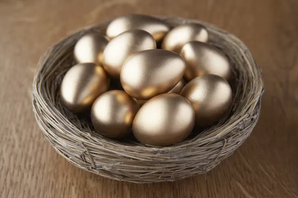 stock image A basket of golden eggs