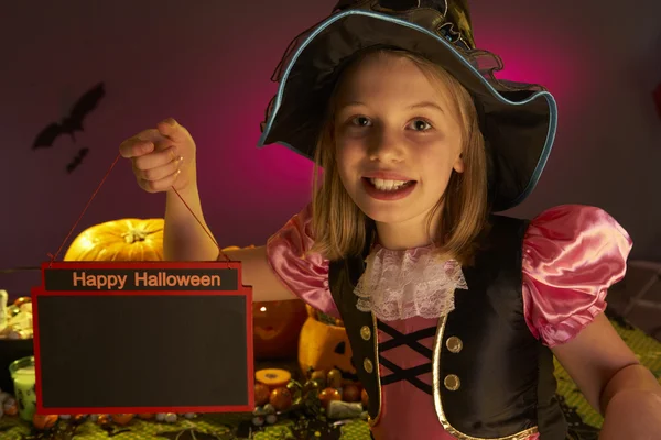 Halloween party with a child holding sign in hand — Stock Photo, Image