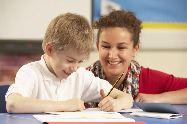 Schoolboy Studying In Classroom With Teacher — Stock Photo, Image